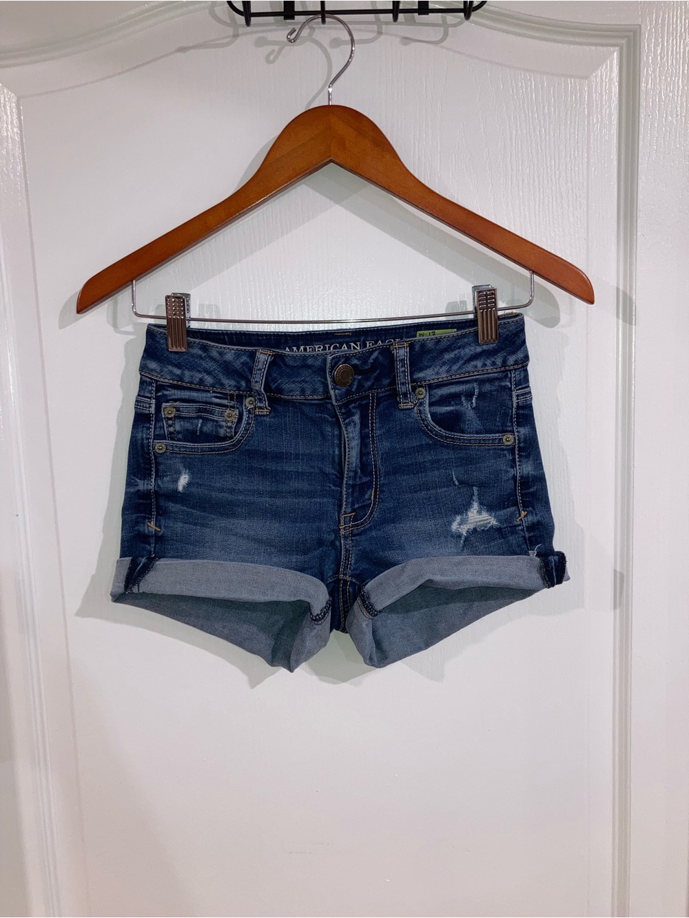 American Eagle Medium Wash Blue Distressed Jean Shorts - size 0